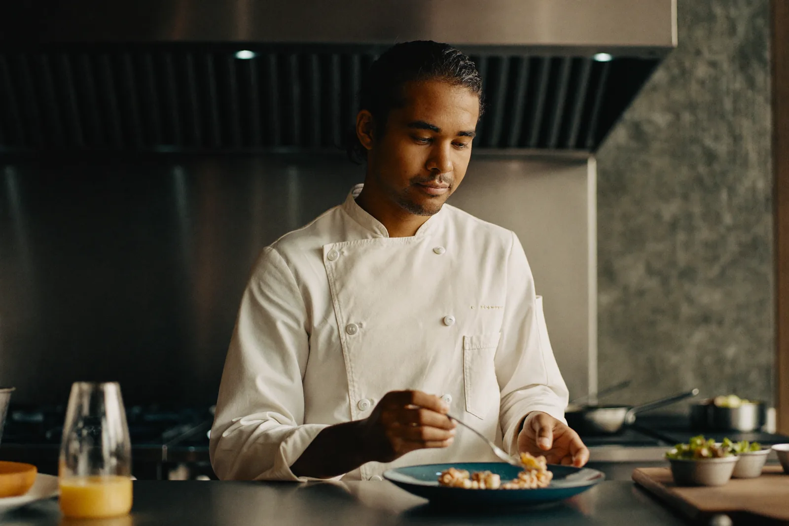 Francophone chef working in an Edmonton restaurant kitchen on a Mobilite Francophone C16 work permit