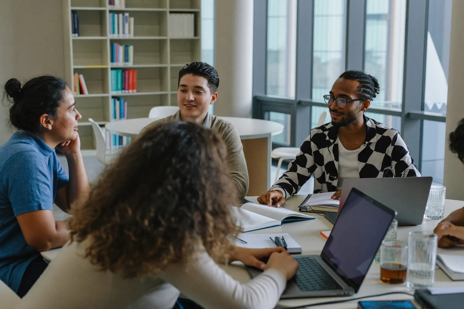 International students studying together in a Canadian university library