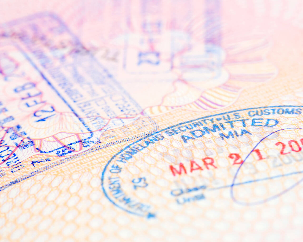 visa stamps on open passport